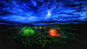 tents at night time set up for wild camping on a DofE expedition