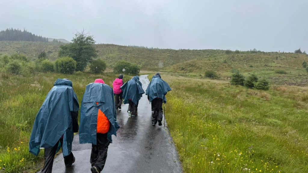 DofE group walking in the rain